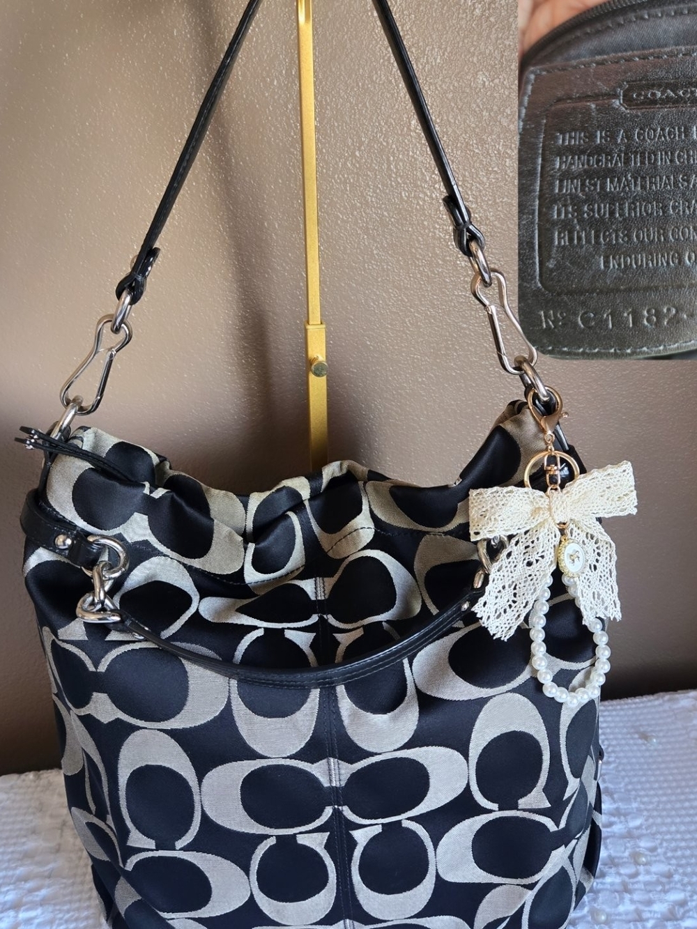 Coach Black and Cream Signature Logo Hobo with Lace Pearl Charm